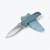 Benchmade Undercurrent knife drawn from its molded blue sheath, showing the blade's design.