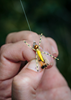 Wet Hopper fly in hand tied on leader.