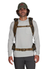 Front view of model wearing Simms Headwaters Backpack