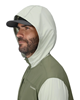 Model with hood up on Simms Latitude BiComp Hoody